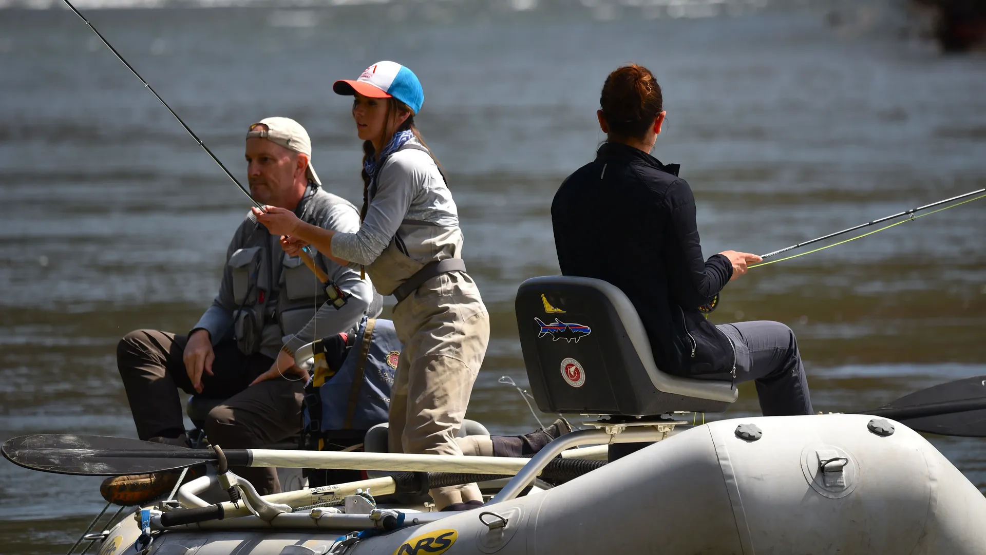 Angler casting from a raft — Fly Fishing Guide School for New York anglers